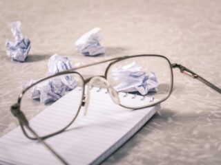 eyeglasses near on paper