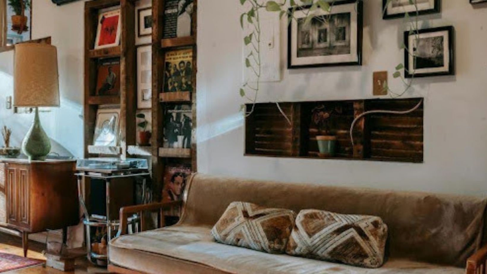 Vintage leather sofa and modern wall art.